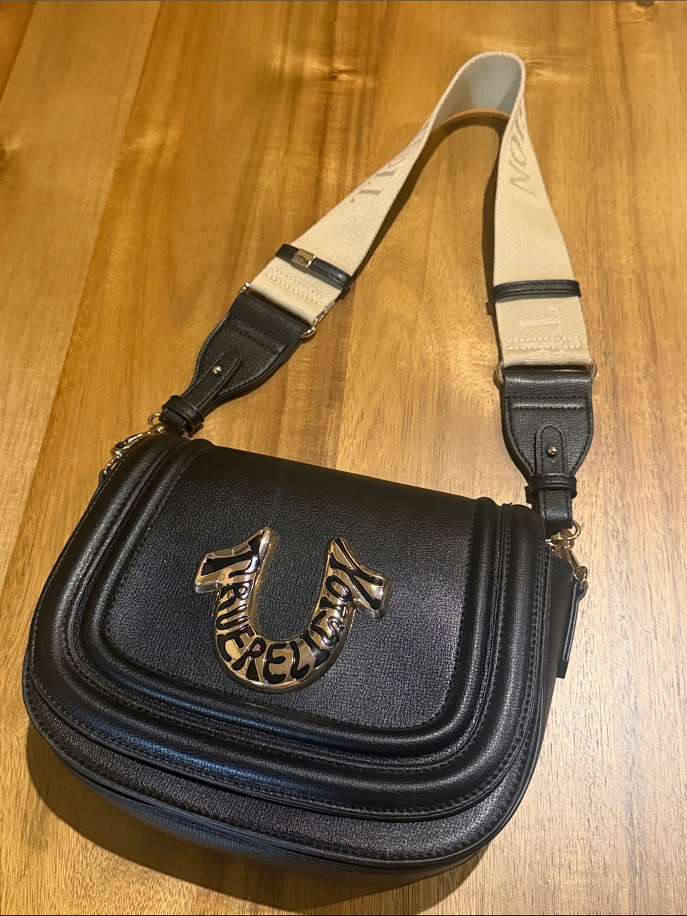 True Religion Black Shoulder Saddle Bag Large Gold Logo NWOT